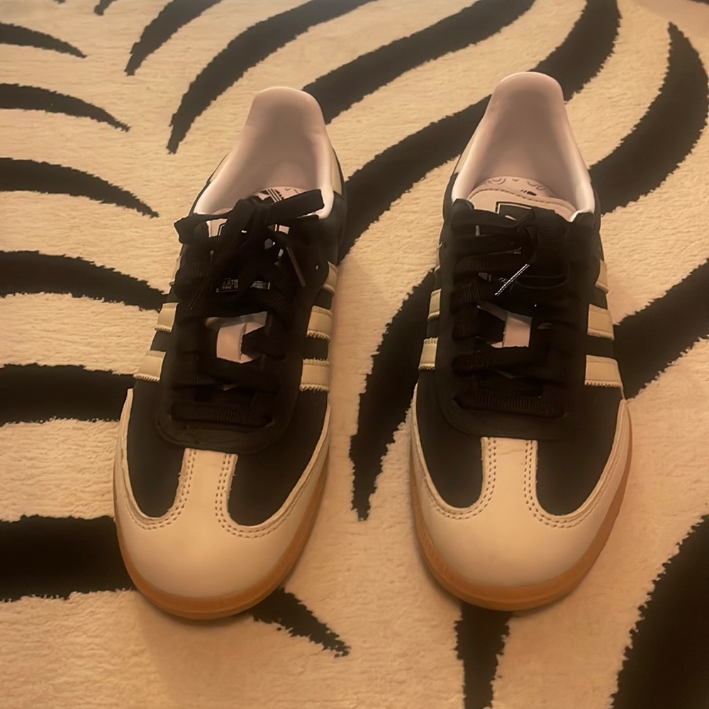 Adidas samba black and white sneakers.